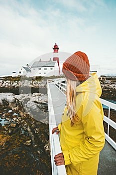 Woman sightseeing Norway lighthouse Travel Lifestyle