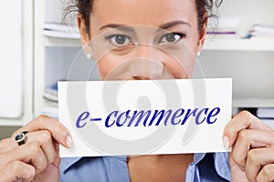 Woman with sign e-commerce