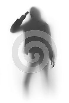 Woman silhouette with cellular phone