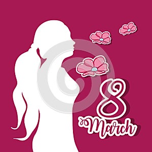 Woman silhouette with flowers and fucsia background photo