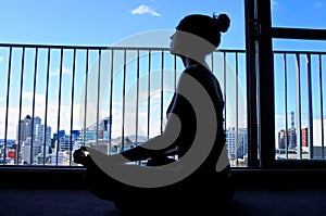 Woman silhouette meditate