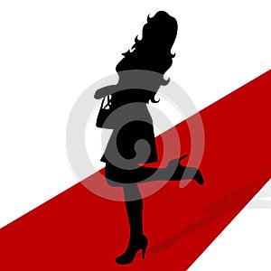 Woman silhouette on a red carpet