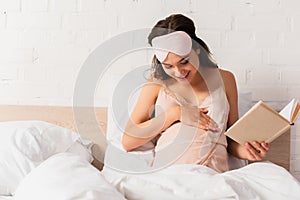 Woman in silk nightie and eye