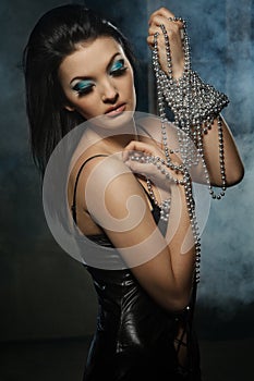 Woman with silver beads