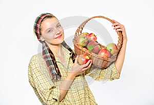 Woman sincere villager carry basket with natural fruits. Woman gardener rustic style hold basket with apples white
