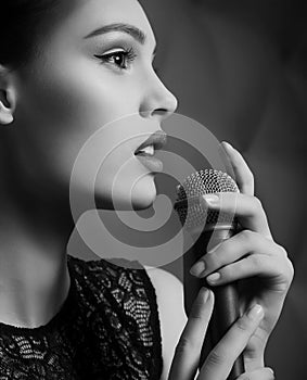 Woman singer with microphone