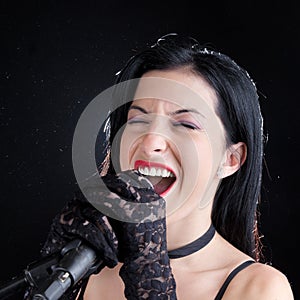 Woman Singing With Microphone