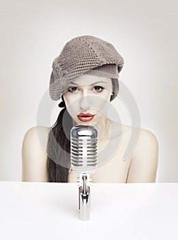 woman singing in retro mic