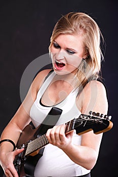 Woman singing rock song guitar isolated