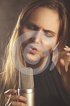 Woman Sings at Concert