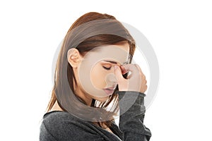 Woman with sinus pressure pain photo