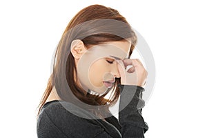 Woman with sinus pressure pain