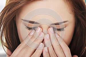 Woman with sinus pressure pain photo