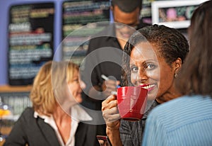 Woman Sipping Coffee