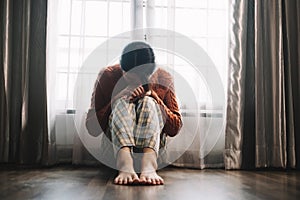 woman sit Depression Dark haired pensive glance Standing by window and anxiety Copy space