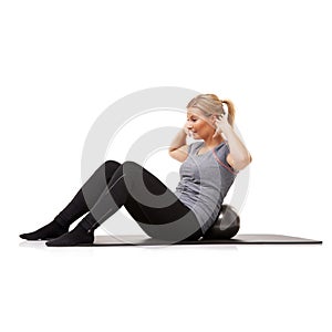 Woman, sit up and exercise ball on yoga mat for abs obliques workout, wellness fitness or white background. Female