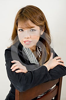 Woman siting on a chair