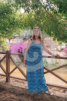 Woman sits on the bench in Alanya city