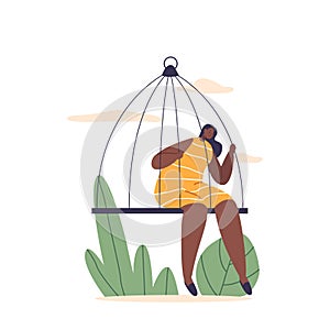 Woman Sits Solemnly Within A Confining Cage, Her Expression Reflecting A Mix Of Vulnerability And Longing For Freedom photo