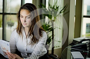 Woman sitting behind a desk