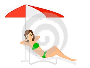 Woman sitting in chaise longue
