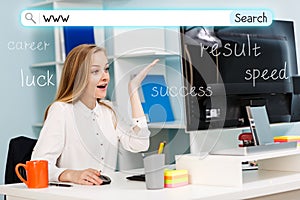 Woman sitting at the desk with computer