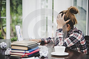 woman sitting down, his face unsettled