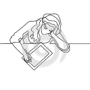 Woman sitting and drawing with tablet.