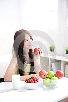 Woman sitting enjoing Apple