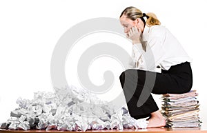 Woman sitting on files