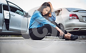 woman sitting on the floor, she stressed and wait for notify insurance agents