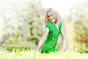 Woman sitting on grass