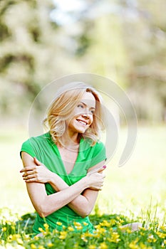 Woman sitting on grass