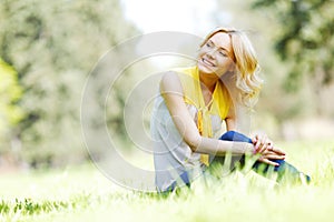 Woman sitting on grass