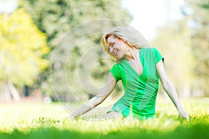 Woman sitting on grass