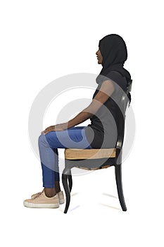 Woman sitting, isolated on white background