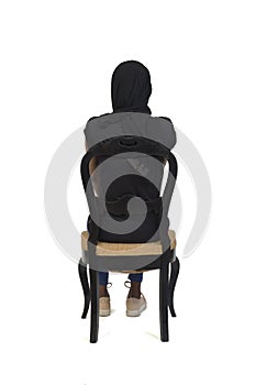 Woman sitting, isolated on white background