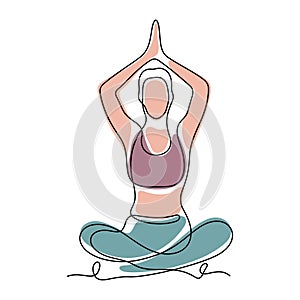 Woman sitting in lotus position and meditating