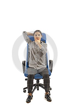 Woman sitting on the office chair and moving her head