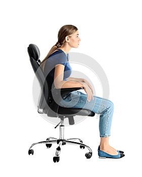 Woman sitting in office chair on white background
