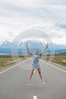 Woman sitting on the road