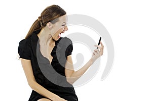Woman sitting on a stool holding a cellphon