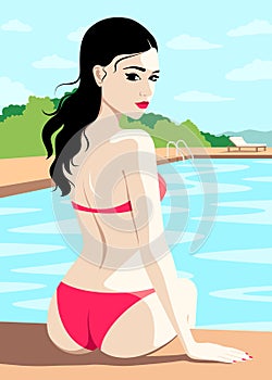 Woman sitting by swimming pool
