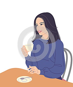 Woman Sitting at Table and Drinking Coffee