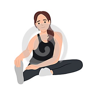 Woman sitting to cooldown stretches after exercise