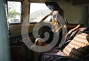 Woman Sitting in a Van Roadtrip