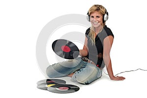 Woman sitting with vinyl records photo
