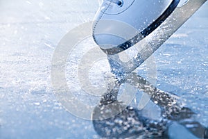 Woman skates braking ice, frazil