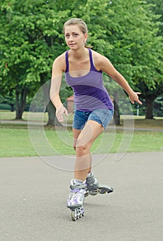 Woman is skating.