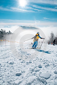 woman skier at ski slop winter resort